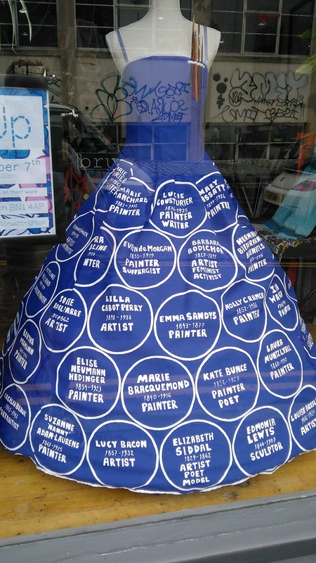 A dress of blue plaques